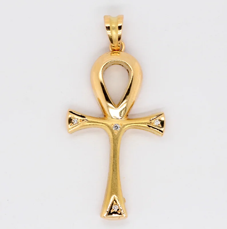 ESTATE 18KY .04 CTTW DIAMOND CROSS PENDANT, G-SI1